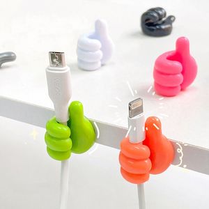 Partihandel Självhäftande väggdekoration Hook Creative Silicone Thumb Key Hanger Hook Home/Office Data Cable Clip Wire Desk Organizer