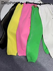 Spodnie damskie zimowe polar grube cukierki kolorowe spodnie dresowe moda Wysokiej jakości wiertarka sportowa kostka 230718