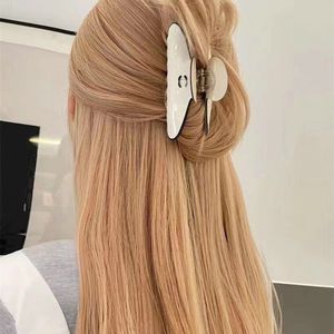 Fermagli per capelli 2024 nuove Barrettes Gioielli di design di lusso Lettera di marca Fermagli per capelli bianchi neri Elegante fermaglio per capelli con temperamento squalo Tornante