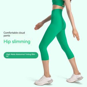 Ll kvinnor beskurna capris designer vår/sommar 2023 NY NO EMBARRASSMENT LINE YOGA CAPRIS Slim Fit Hip Lift Fitness Pants