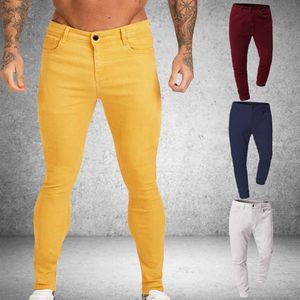 Мужчины растягивают скинни сплошные джинсы 4 цвета повседневная джинсовая банки мужчина желтые красные серые брюки мужские тонкие брюки180W
