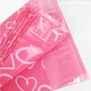 Lote de 100 pçs Rosa Poly PE Mailer Express Bag 28 42cm Mail Bags love heart Envelope Self-Seal Plastic bags for yxy01572090
