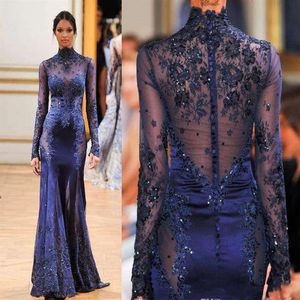 2017 Azul marinho Gola alta Renda Vestidos de noite formais Manga longa Transparente Miçangas Apliques Vestidos de baile de celebridades Personalizado 276o