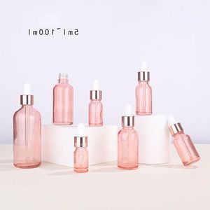 卸売空のエッセンシャルオイルボトル5ml 10ml 15ml 20ml 30ml 50ml 100mlローズゴールドリッド化粧品用ピンクガラスドロッパーボトルcnhbo