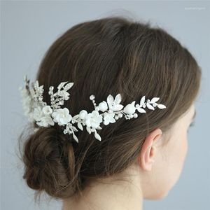 ヘアクリップホワイト磁器の花ブライダルコームクラウンシルバーラインイーストン女性ヘッドピースウェディングプロムアクセサリーティアラ