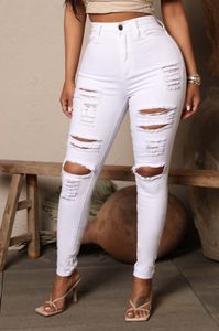 Kvinnors byxor nödställda rippade elasticitet jeans hög midja vita svarta jeans byxor mode kvinnlig höst denim byxor