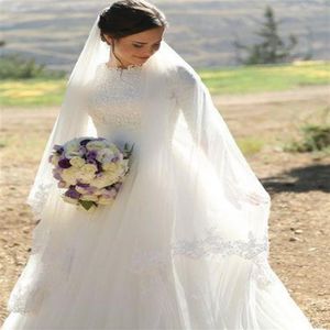 فساتين زفاف طويلة الأكمام المسلمة 2019 S جديدة ساتين تول ، وهي ثياب زفاف متواضعة من الدانتيل المتواضع