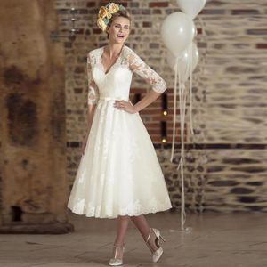 Vintage koronkowe sukienki ślubne głębokie v szyja długość herbaty z lat 50. krótki szarf