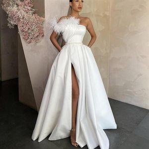 Elegant White Evening Dresses Sexy High Side Split Party Gowns Floor Length Ruched Satin With Pockets Feather Fur Prom Dress Strap238w