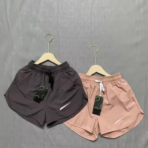 Pantaloncini sportivi ad asciugatura rapida Pantaloni da yoga per allenamento estivo anti-esposizione da donna Pantaloncini finti in due pezzi Marea