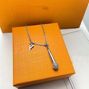 Microphone necklace V-shaped hook microphone pendant Hip-hop style wild couple models258G