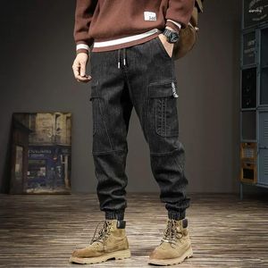 Herr jeans modedesigner män svart färg stretch lös passform denim lastbyxor hombre streetwear hip hop joggar casual overalls