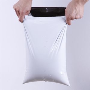 100pcs Lots White Courier Bag Express Envelope Storage Bags Mail Mailing Bags Self Adhesive Seal Plastic Packaging Pouch331r