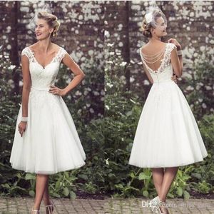 Elegancka długość herbaty Krótkie sukienki ślubne 2019 CAP Rękawy Aplikacje koronkowe suknie ślubne Tiul V Szyja Krótkie suknie ślubne Tanie 266H