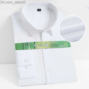 Camisolas masculinas S ~ 8XL Têxteis de bambu camisa branca masculina manga longa vestido masculino elástico ultrafino resistente a rugas adequado para camisa social camisa formal Z230721