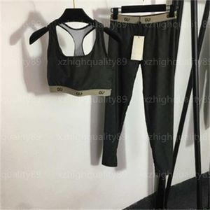 Abbigliamento sportivo da donna Abbigliamento da yoga Tuta da donna Set da due pezzi Lettera Fettuccia in vita Canotta con imbottitura sul petto Pantaloni skinny elasticizzati Pantaloni Tute firmate