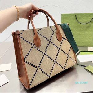 2023-Luxury designer borsa shopping bag Borsa da spiaggia da viaggio da donna Moda grande capacità doppia lettera retrò tracolla larga tracolla