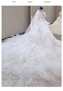 2023 New Lace A-Line Wedding Dresses diamond Sheer Neck Long train Beaded Overskirt Dubai Arabic Bridal Gowns Church garden boho Wed Dress multilayer shiny gown