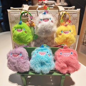 歯付き雪のモンスターぬいぐるみ人形卸売小さなペンダント人形キーチェーンかわいい学校袋布人形学校バッグペンダント