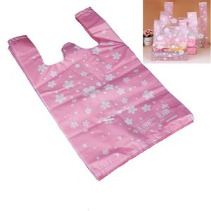 Hediye sargısı 100pcs/lot süpermarket alışveriş plastik torbalar pembe kiraz çiçeği yelek çantaları hediye kozmetik çantalar gıda ambalaj çantası şeker çantası 230720