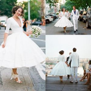 Abiti da sposa corti vintage anni '50 2019 Vendita su misura New A-Line profondo scollo a V lunghezza tè mezza manica abiti da sposa in raso 281v