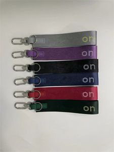 Lu Fashion Yoga Keychain 절대 잃어버린 여성 피트니스 탄성 키 체인 샤 산성 품질