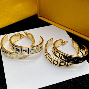 Brincos toroidais femininos Designer de joias de aço inoxidável Banhado a ouro 18k Metal de luxo Joias modernas e elegantes Pacote com caixa