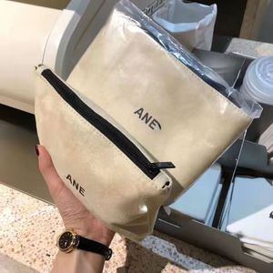 Bolsa de cosméticos de novo Viagem Bolsa de lavagem portátil Sacos de armazenamento de bolsas de embreagem simples