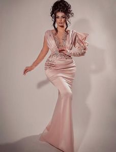 2023 Sexy Mermaid Evening Dresses Wear Blush Pink Arabic Long Sleeves Illusion Crystal Beads Floor Length Party Prom Gowns Special Occasion Wears