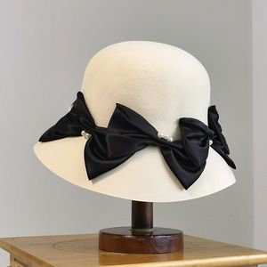 Cappello da pescatore con fiocco di perle di lana giapponese di alta qualità Cappello di feltro moda cappello di lana stile Hepburn dal temperamento elegante e delicato