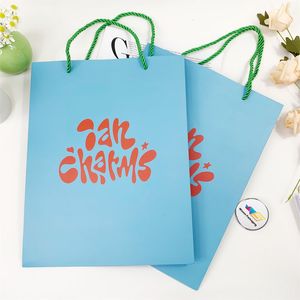 2023 Wholesale Custom Logo Cardboard Packaging Retail Gift Boutique Shopping Packaging Paper Bag For Clothing Shoes