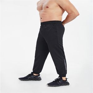 MBF20136 Pantaloni da corsa spessi neri da uomo Pantaloni slim in cotone Comodi pantaloni sportivi affusolati Casual con tasche per301M