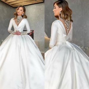 2020 Dubai Arabic High Neck Satin Ball Gown Wedding Dresses Sparkly Crystals Beaded V Neck Long Sleeve Illusion Back Bridal Gowns 293M