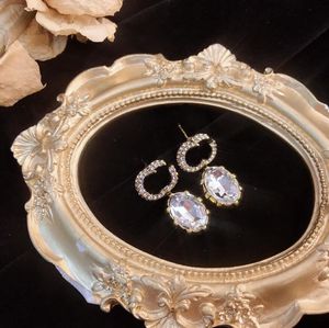 Alta qualidade luxo feminino moda garanhão estilos clássicos prata banhado a ouro aço inoxidável casal presentes designer jóias brincos de noivado atacado 20 estilos