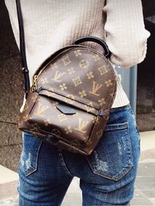 top quality lady luxurys crossbody designer woman mini travel backpack girl school shoulder bags designers women purse tote bag wallet men brown floral handbags