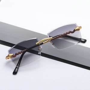 2023 NYA POLYGON RIMLESS SUNGLASSES Kvinnor Retro Snake Decoration Clear Ocean Lens Eyewear Men Sun Glasses UV400 Shades