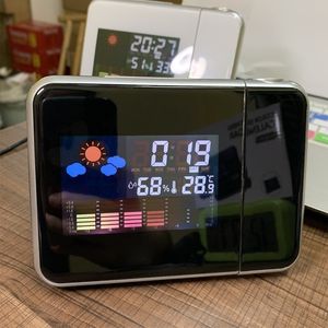 Masa Tablosu Saatleri Yaratıcı Dikkat Projeksiyonu Dijital Hava LCD SCOOZE Saat Zil Alarm Ekran Arka Işığı LED Projektör Ev Zamanlayıcısı 230721