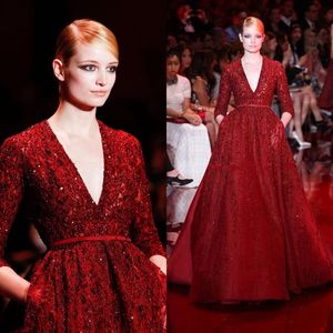 Gorgeous Elie Saab Red Noble Evening Dresses Celebrity Dresses Sequins Shining Deep V-neck Floor Length Long Sleeves Runway Formal224G