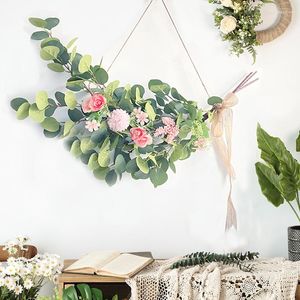 Flores decorativas Planta artificial verde Folha de eucalipto Coroa de vime Fundo de casa Decoração para pendurar na parede Quarto