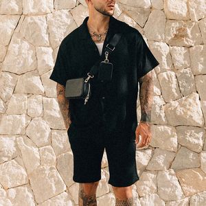 Męskie dresy 2023 Summer Streetwear Mens Dwuczęściowe garnitury plażowy swobodny luźny guzik z krótkim rękawem i szorty wolne zestawy solidów mężczyzn 230724