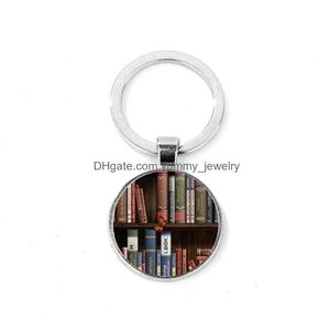 Keychains Lanyards Keychains Lanyards Vintage Books Po KeyChain Cat Library Book Glass Dome Sier Plated Key Chain Handgjorda gåva för elever Lär DHXT3