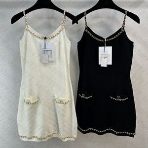 23SS Kobiet Knit Dress Designer Sukienka z literą przyciski pasa startowego Rękawka projektantka Zestaw Topy Zbiornik Ubranie Odzież Wysokiej klasy elastyczność A-line Bodycon Camisole Spódnica