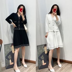 New s-andro Fashion Knitting Slim Temperament Short Top Half Skirt Fashionable Two Piece Set