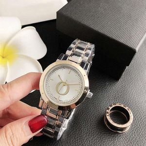 Modemärke klockor för kvinnor Lady Girls Crystal Steel Steel Metal Band Quartz Wrist Watch P78259U