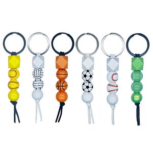 Träpärlad nyckelring pendelle sport basket fotboll baseball tofs pärla nyckelringar nyckelkedjor nyckelning