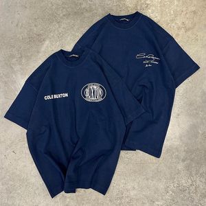 男性S Tシャツ23SSネイビーブルーコールバクストンTシャツ男性女性ヘビーファブリック品質ルーズティークラシックスローガンプリントCBショートスリーブ230724