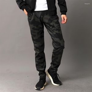 Pantaloni da uomo in pelle primavera e autunno Young Elastic Motorcycle Slim Riding Pu resistente all'usura