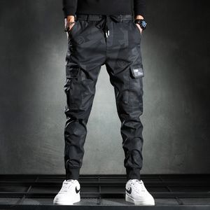 Mensbyxor Sweatpants män kamouflagelasticitet Militärlast med flera fickor Bottoms Bottoms avslappnade joggerbyxor 230724