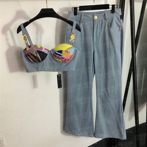 Sling denim väst jeans set för kvinnor Luxuxry metall axel spänne tank top hög midja byxor 2 st.