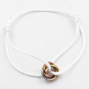 Mens Womens Pulseira Designer Pulseira Moda Trinity Pulseira 316L Aço Inoxidável Trinity Ring String Pulseira Três Anéis Hand Strap Casal Pulseira 2024